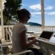 Human language teacher helping student learn while AI tools support practice